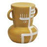 Abstract face ceramic stool in tan with white illustration