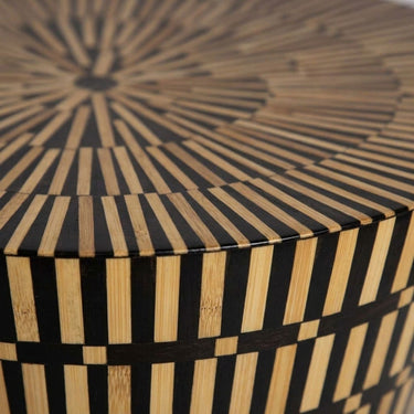 Amelia hourglass bamboo inlay side table with black and natural striped pattern.