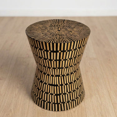 Amelia hourglass bamboo inlay side table with black and natural striped pattern.