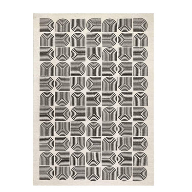 Full view of the arcade rug in Domino showing black-and-white geometric pattern.