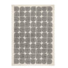 Full view of the arcade rug in Domino showing black-and-white geometric pattern.