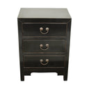 Angled side view of the black Arka Bedside Table, highlighting its elegant and durable elmwood construction