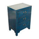 Angled view of the blue Arka Bedside Table highlighting its old-world craftsmanship and 3 drawers