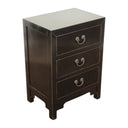 Black Arka Bedside Table with three drawers, showcasing timeless solid wood craftsmanship