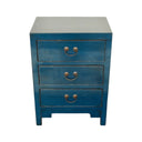 Blue Arka Bedside Table handcrafted from solid elmwood featuring three drawers.