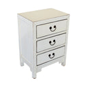 Angled shot of the white Arka Bedside Table showing the lived-in texture of the elmwood finish