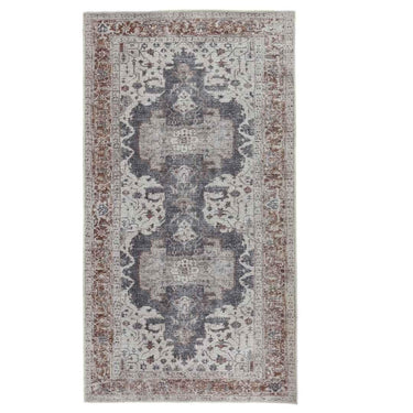 Decorative area rug with intricate patterns on a white background