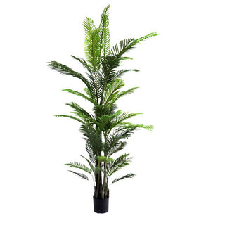 Artificial palm tree in a pot on a white background