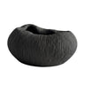 black ribbed bowl with textured surface and rounded organic shape.