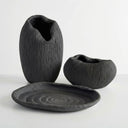 Atoll black ribbed collection with a vase, tray and bowl in deep black with fine ridges
