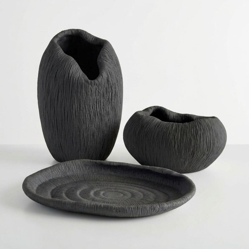 Atoll black ribbed collection with a vase, tray and bowl in deep black with fine ridges