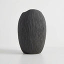 Deep black ribbed vase with fine ridges.