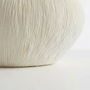 textured base of the atoll ribbed decorative bowl.