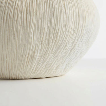 textured base of the atoll ribbed decorative bowl.