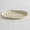 Atoll decorative tray with an off-white matte finish and ribbed, textured surface.