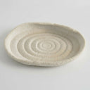 Atoll decorative tray with an off-white matte finish and ribbed, textured surface.