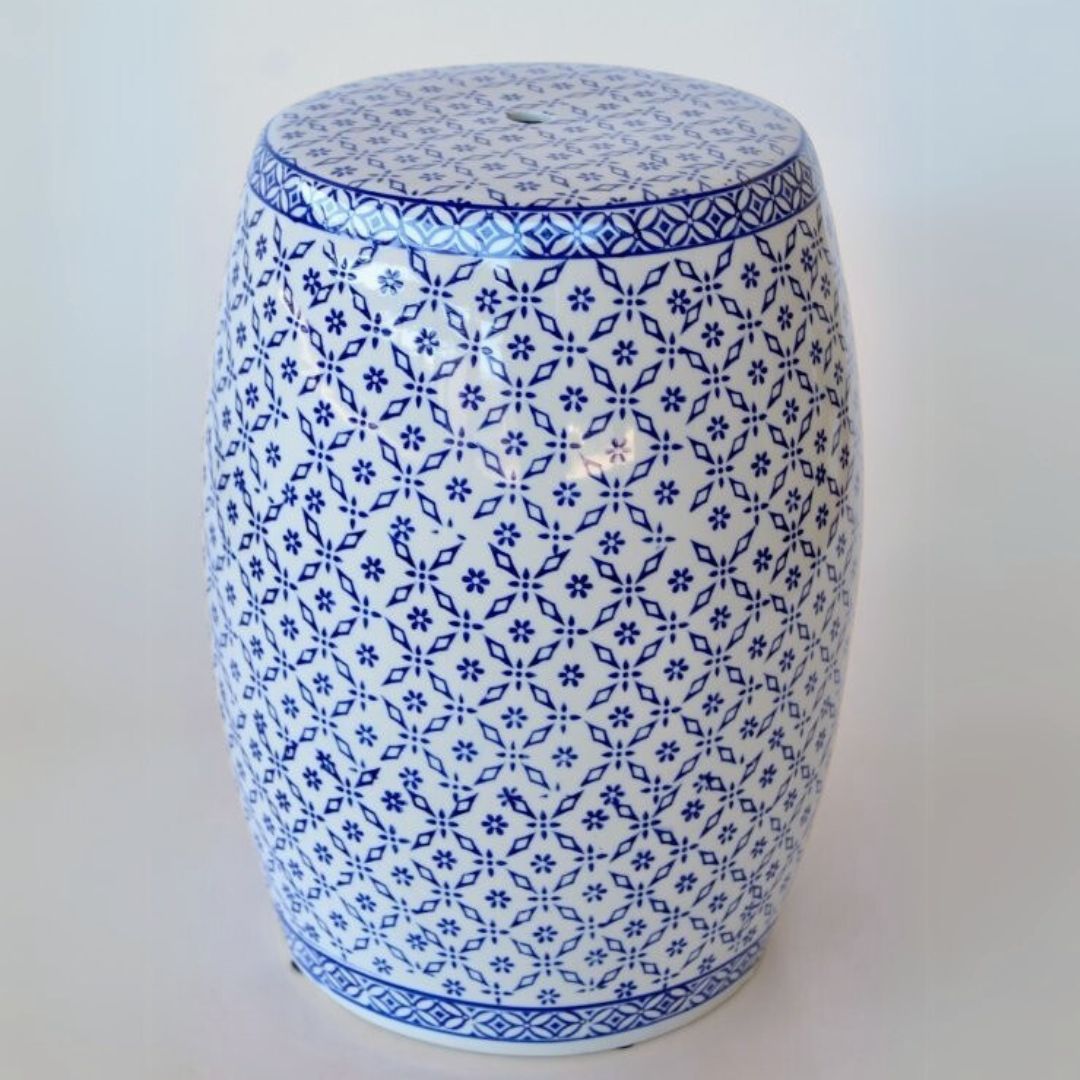 Blue and white ceramic side table with high-gloss finish