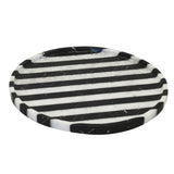 Black and white marble tray round shape with bold striped pattern