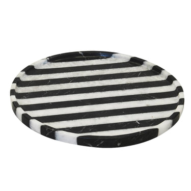 Black and white marble tray round shape with bold striped pattern