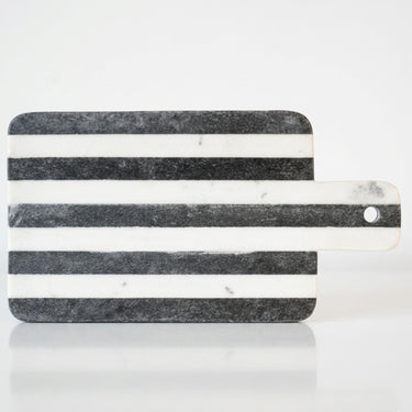 Marble-patterned cutting board with black and white stripes 