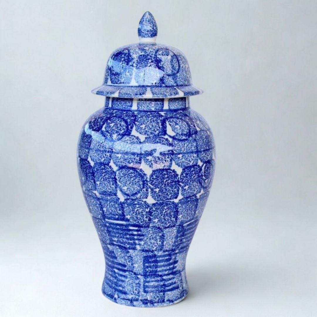 Blue and white ceramic jar  with a lid on 
