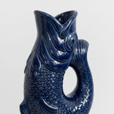 Detailed close-up of the blue koi jug vase