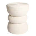 A modern three-tiered rattan side table stool with a stacked, ribbed design in a white colour.