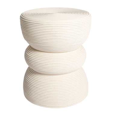 A modern three-tiered rattan side table stool with a stacked, ribbed design in a white colour.