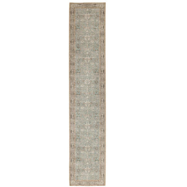 Cathy runner rug in silk-look polyester, showcasing its distressed Persian-inspired blue floral border pattern designed for hallways.