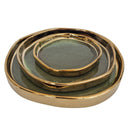 Ceramic decorative tray set of three stacked together showing green finish and gold rim