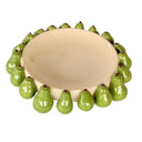 Ceramic fruit bowl with glossy green pears