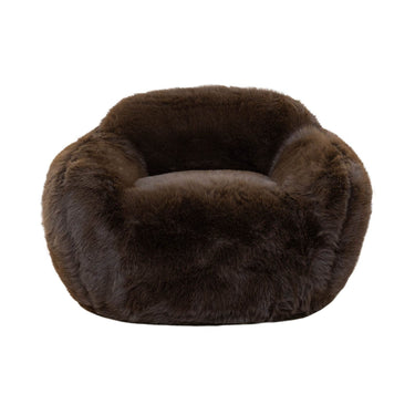 Snuggles chocolate brown lounge chair showing the thick, cloud-soft faux fur upholstery.
