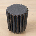 Side Table  with deep vertical ridges, finished in a reactive glaze blending dark navy blue with metallic bronze tones. 