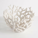 A white coral-shaped decorative bowl with an intricate, branching open structure.