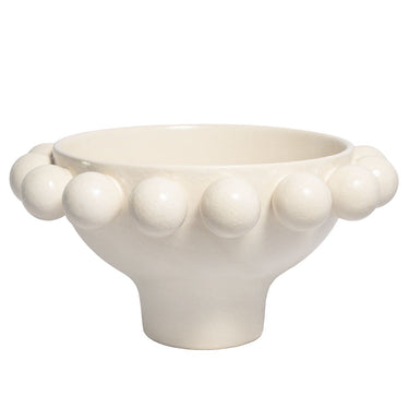 Cream ceramic pedestal bowl with large decorative bobble accents on rim.