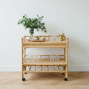 rattan drinks trolley styled with eucalyptus and decanter