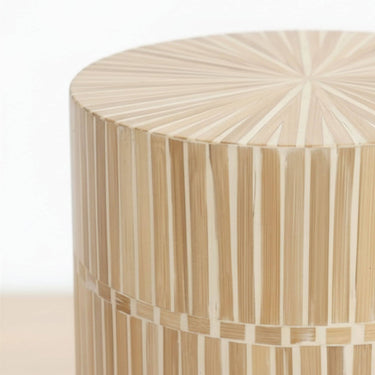 Close-up of the round tabletop surface showing a natural mother of pearl mosaic inlay pattern.