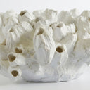 White artificial barnacle decoration with multiple textured barnacles.