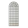  Dstressed frame finish and window-style panes on the Fenestra arched mirror by Woodka Interiors.