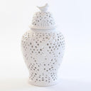 White ceramic jar with decorative lattice design and bird on top 