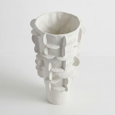 Flange ceramic tall white vase with grid pattern.