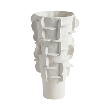 A white ceramic sculptural vase with an organic, layered abstract design and a flared base.