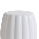 Detailed close-up of the sculpted fluted surface and gloss white glaze on the ceramic stool