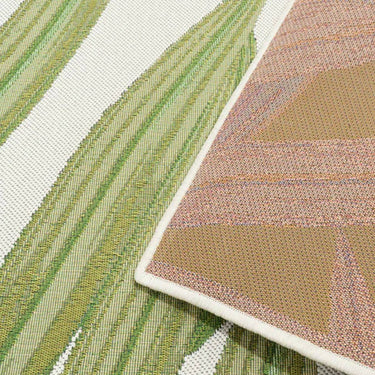 Close-up of the Folia White Rug detailed tropical botanical pattern