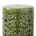 Close-up of the Forest Ceramic Stool's botanical motif, highlighting the intricate raised floral pattern on the dark green glazed surface