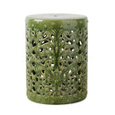 Forest Ceramic Stool in dark green glaze, full view showing cylindrical body with botanical cut-out details and stud-trimmed edges