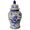 a blue and white vase with a dragon design