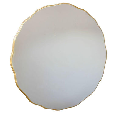 Round mirror with a gold frame 