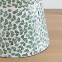 Close-up of the base of the green shell accent stool