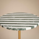 Close-up of striped marble top side table edge detail